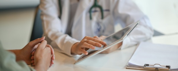 Doctor with patient_adobe_express