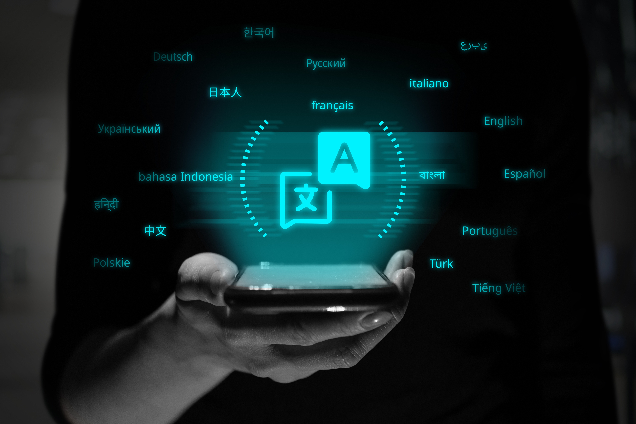 Hand holding a smartphone with glowing icons and text representing various languages, symbolizing translation technology.